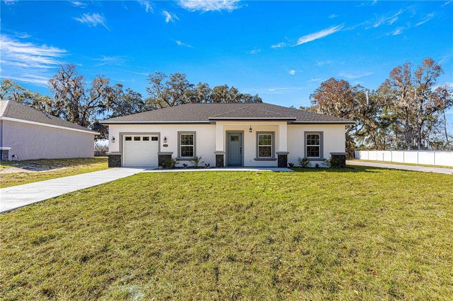 Exterior details and patio area of a home in , Summerfield (Image 17).