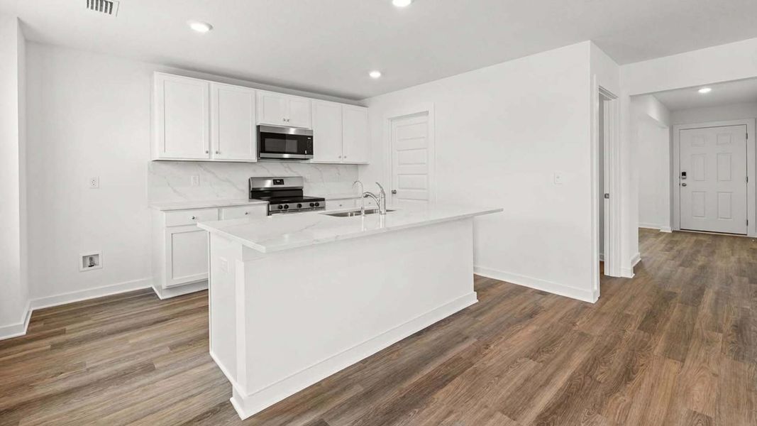 Furnished interior view inside a new home in Magnolia at the Bluffs Phase 3, Freeport (Image 3).