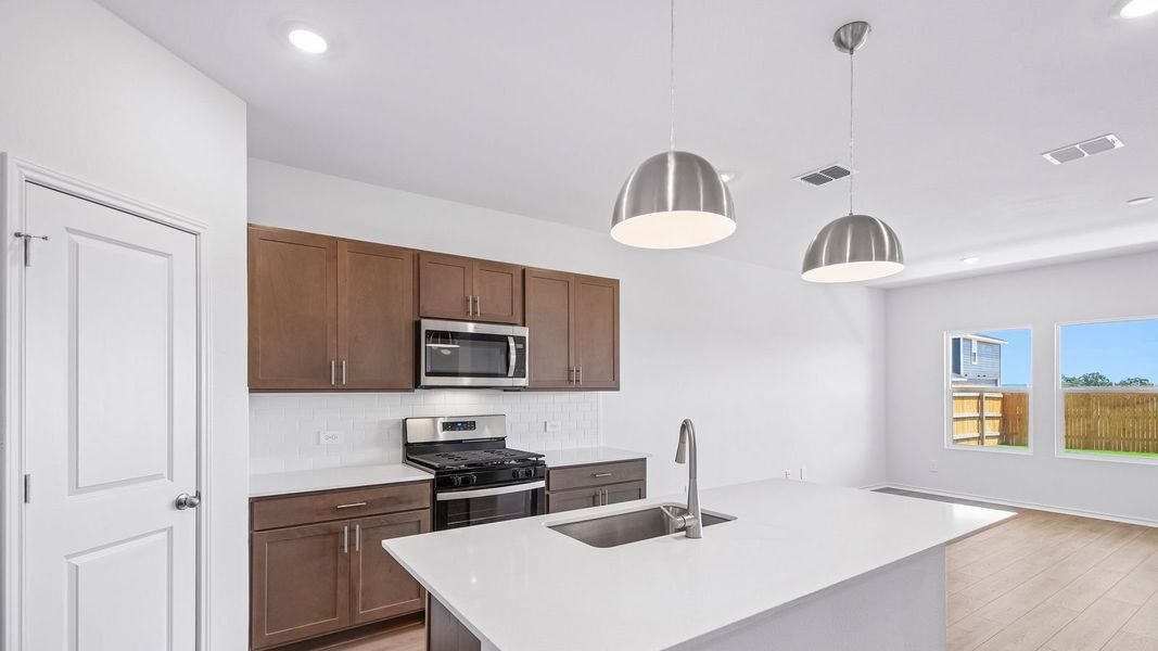 Furnished interior view inside a new home in Valverde, Bastrop (Image 6).