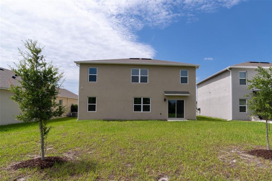 Exterior details and patio area of a home in , Harmony (Image 3).