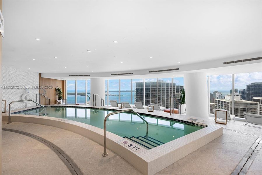 Furnished interior view inside a new home in Aston Martin Residences, Miami (Image 14).