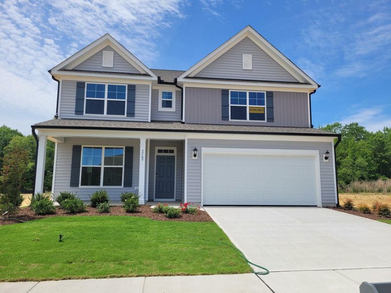 Front exterior of a new home in 1158 Place, Wilson, NC, highlighting curb appeal (Image 1).