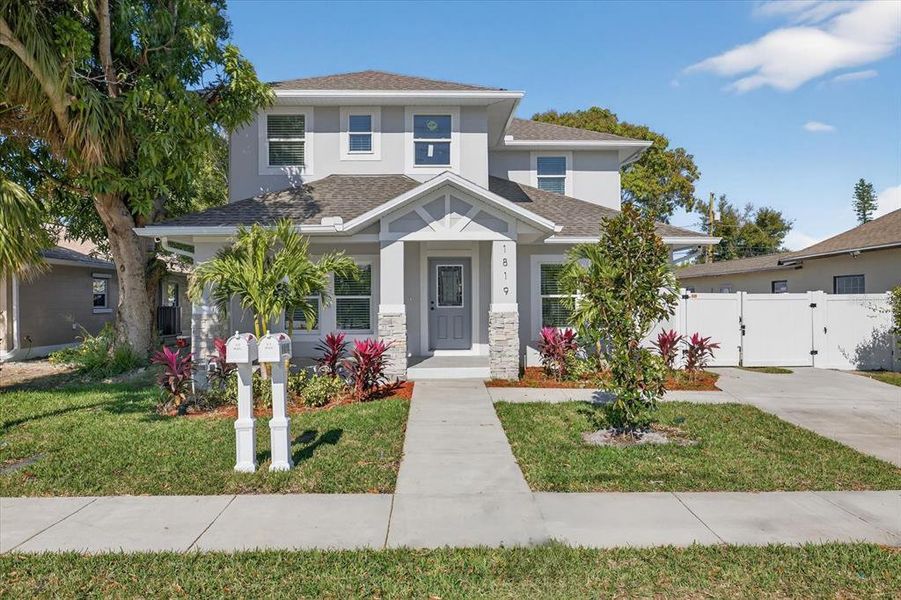 Front exterior of a new home in , St. Petersburg, FL, highlighting curb appeal (Image 29).
