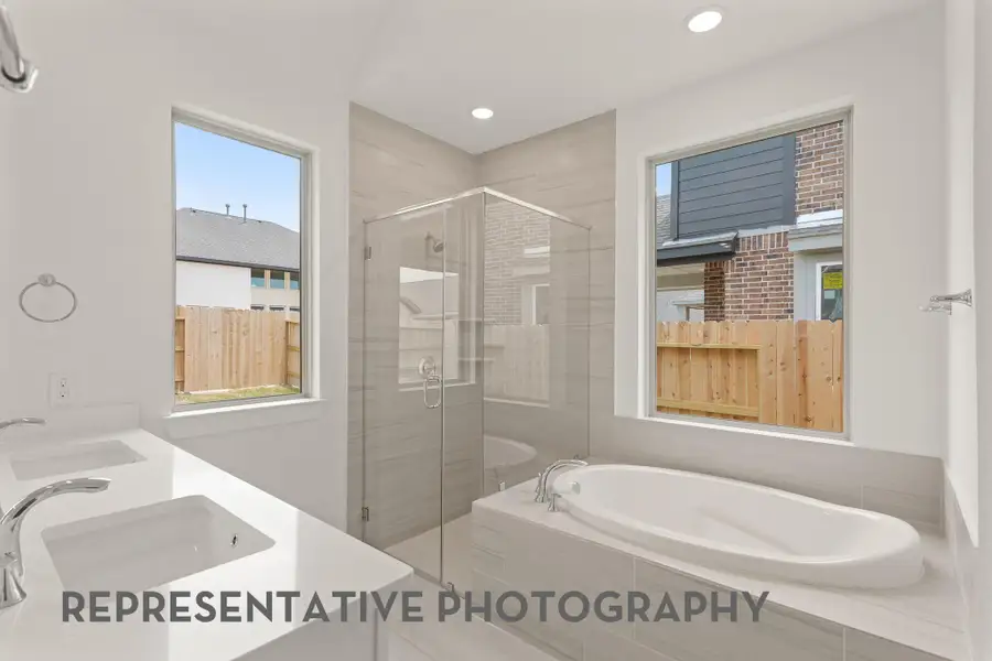 Furnished interior view inside a new home in Bridgeland, Cypress (Image 3).