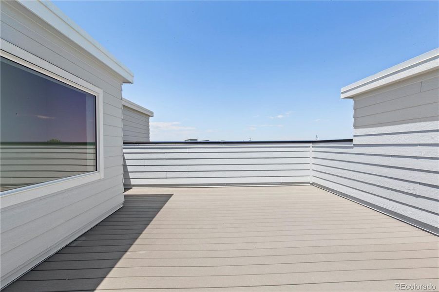 Front exterior of a new home in Dillon Pointe - Skyview, Broomfield, CO, highlighting curb appeal (Image 19).