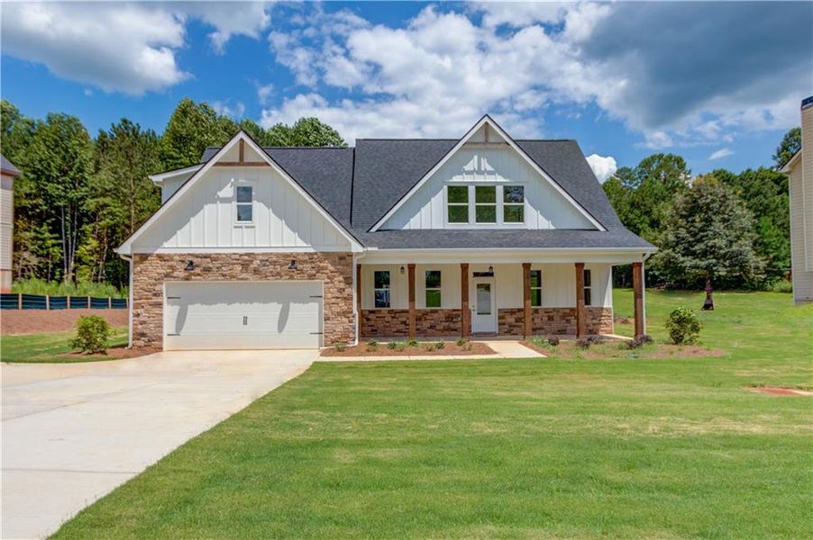 Front exterior of a new home in , Dawsonville, GA, highlighting curb appeal (Image 16). Front exterior of a new home in , Dawsonville, GA, highlighting curb appeal (Image 16).