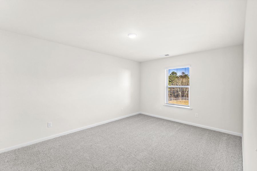 Spacious, unfurnished interior of a new home in The Grove, Florence (Image 31).