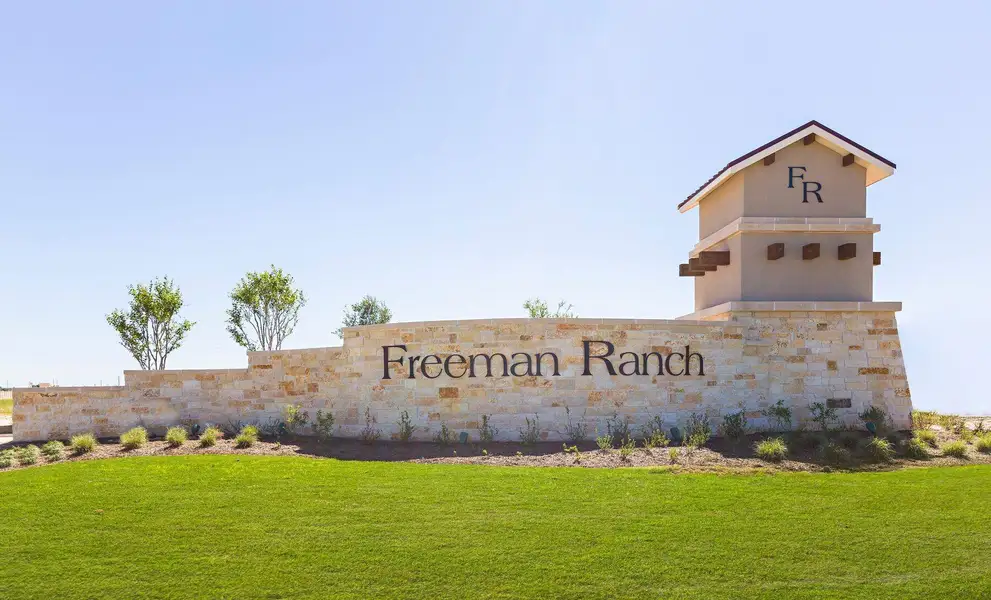 Front exterior of a new home in Freeman Ranch, Katy, TX, highlighting curb appeal (Image 1).