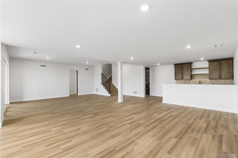 Spacious, unfurnished interior of a new home in Luxe at The Canyons, Castle Pines (Image 36).