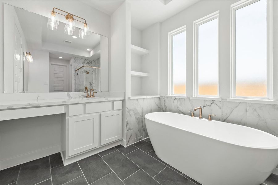 Furnished interior view inside a new home in Sunterra, Katy (Image 3).
