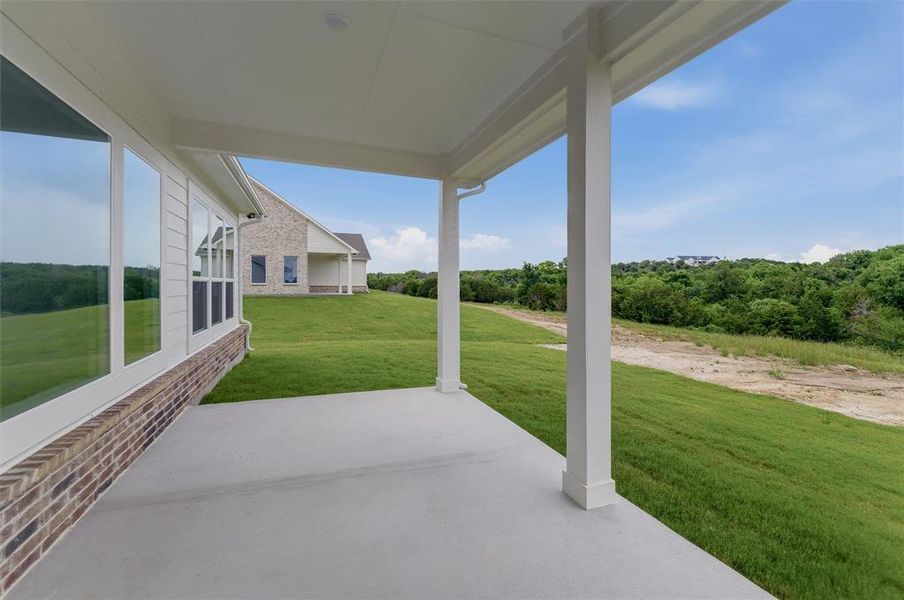 Covered patio with a concrete surface