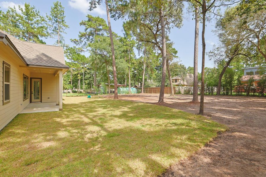 Exterior details and patio area of a home in , Magnolia (Image 3).