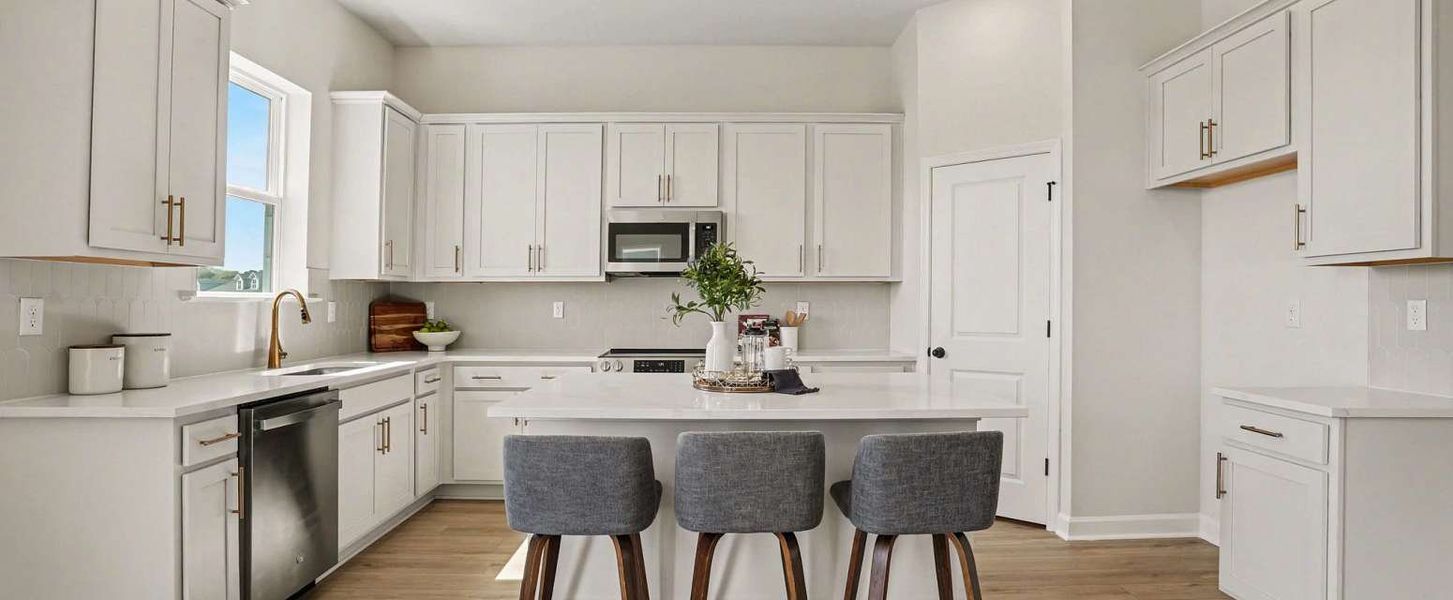 Representative furnished interior of a home built from the Sedona by Ashton Woods in Blue Heron Retreat, Little River (Image 8).
