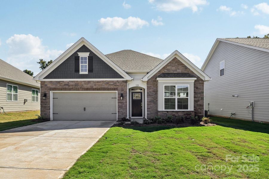 Front exterior of a new home in Brookside, Troutman, NC, highlighting curb appeal (Image 2).