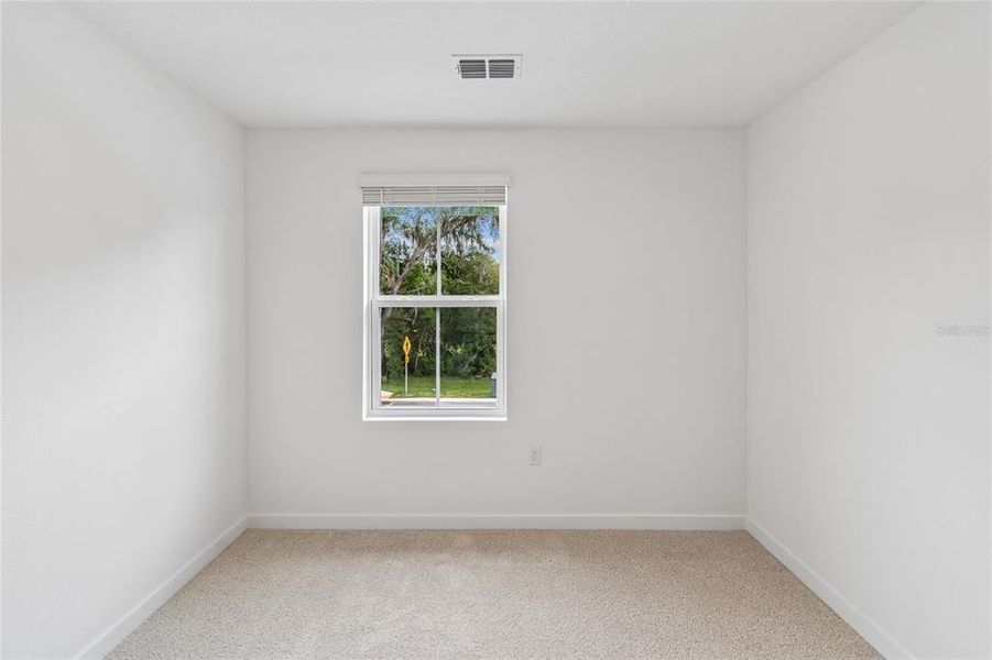 Spacious, unfurnished interior of a new home in Aspire at Canter Creek, Davenport (Image 17).