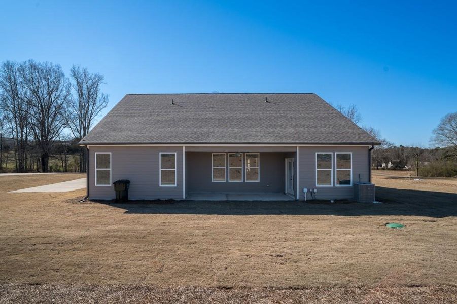 Exterior details and patio area of a home in Magnolia Ridge, Monroe (Image 4).