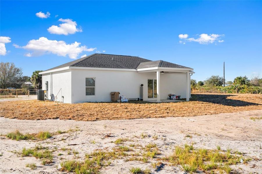 Exterior details and patio area of a home in , Okeechobee (Image 25).