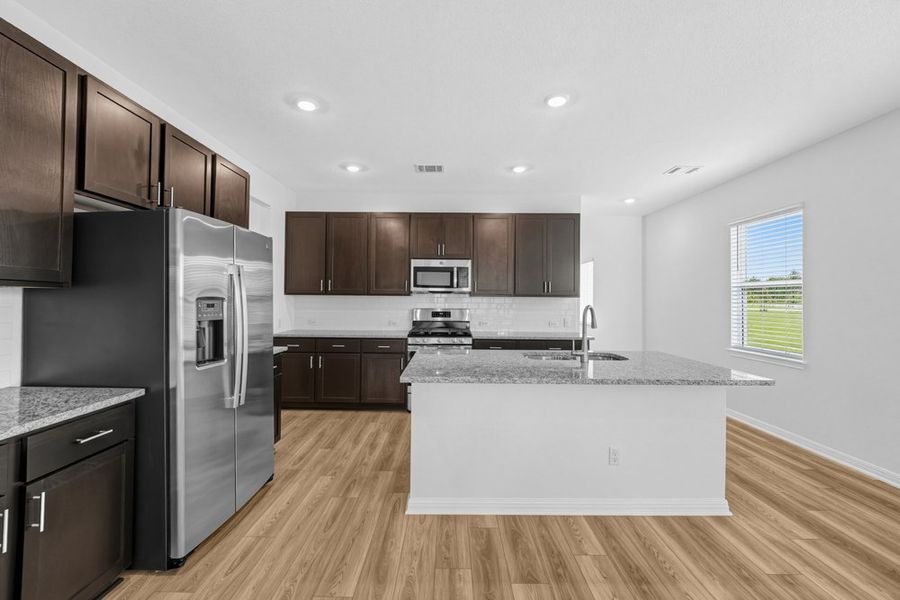 Furnished interior view inside a new home in Sunfield, Buda (Image 6).