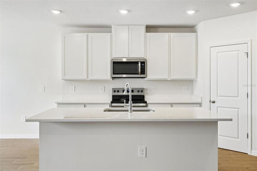 Furnished interior view inside a new home in Pine Ridge Meadows, Hudson (Image 12).