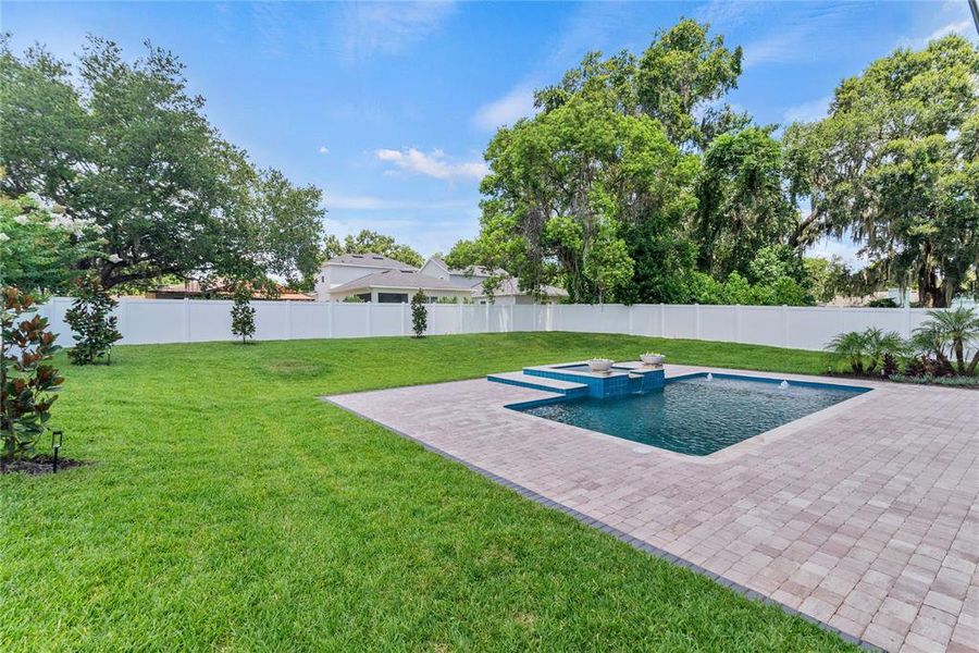 Heated pebbletec saltwater pool with spa, sunshelf with water feature, variable speed high efficiency pump, and 2 gas fireballs Heated pebbletec saltwater pool with spa, sunshelf with water feature, variable speed high efficiency pump, and 2 gas fireballs