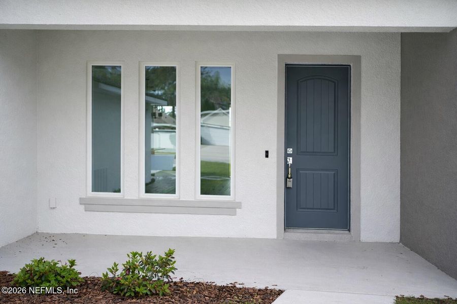 Exterior details and patio area of a home in , Palm Coast (Image 24).