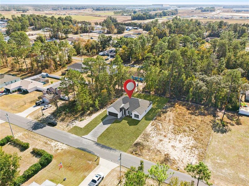 Front exterior of a new home in , Ocala, FL, highlighting curb appeal (Image 25).