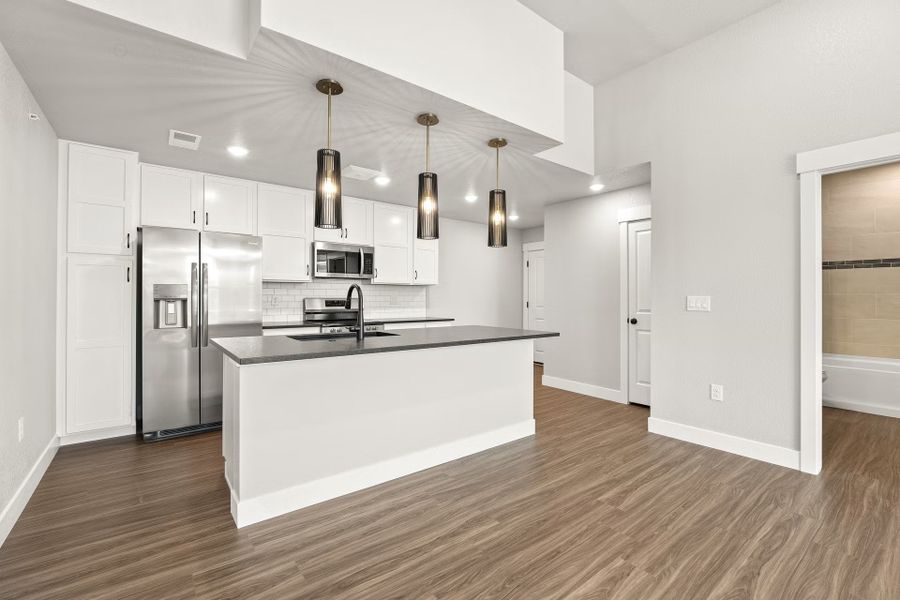 Furnished interior view inside a new home in Northfield - The Flats, Fort Collins (Image 6). Furnished interior view inside a new home in Northfield - The Flats, Fort Collins (Image 6).