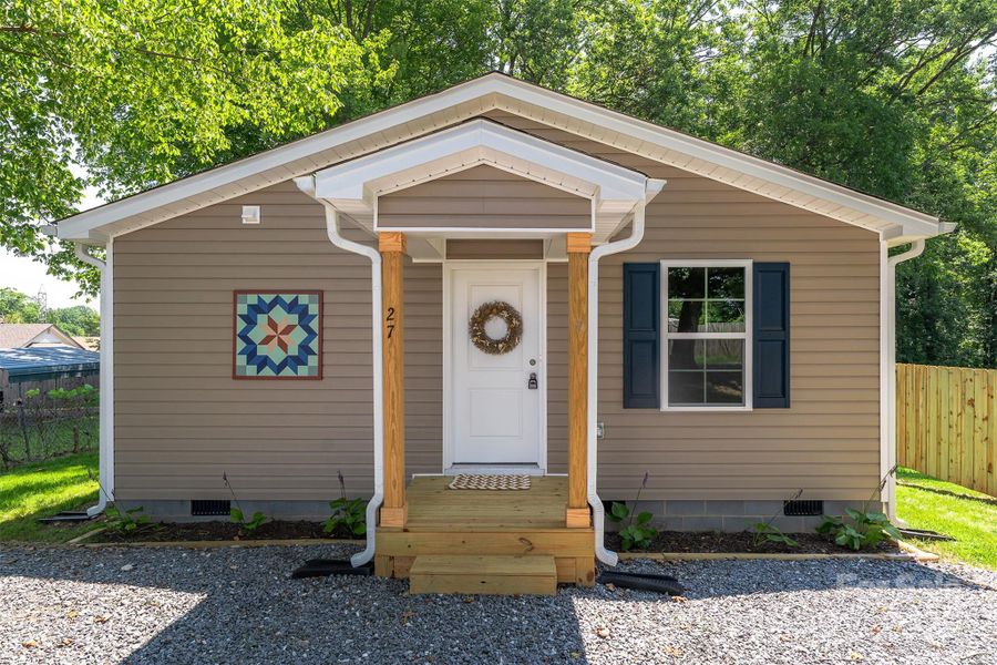 Front exterior of a new home in , Marion, NC, highlighting curb appeal (Image 15).