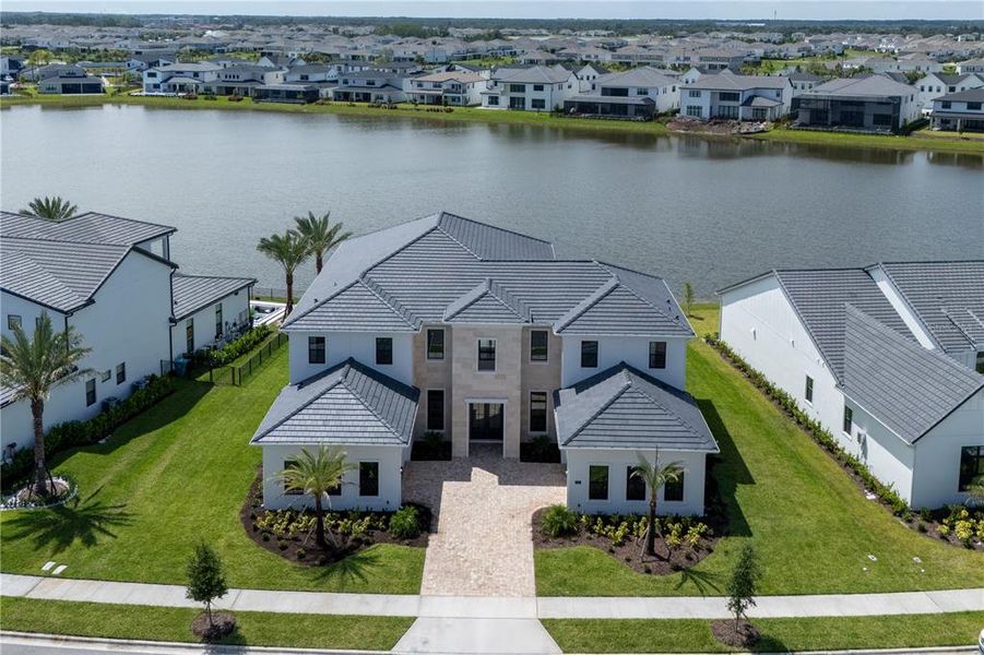 Front exterior of a new home in , Orlando, FL, highlighting curb appeal (Image 2).