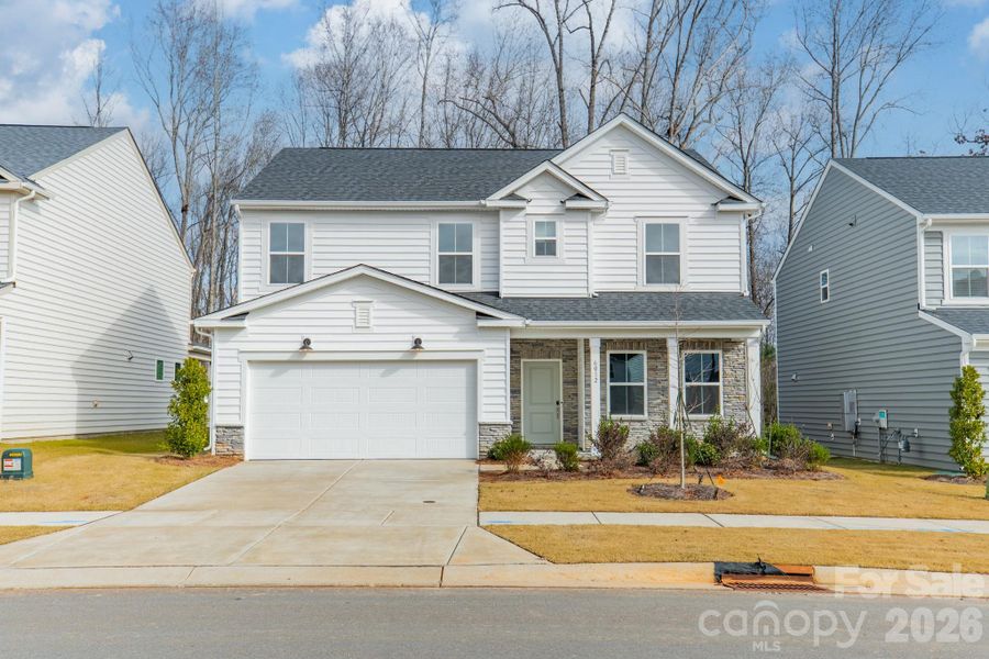 Front exterior of a new home in Stewarts Landing, Charlotte, NC, highlighting curb appeal (Image 2).