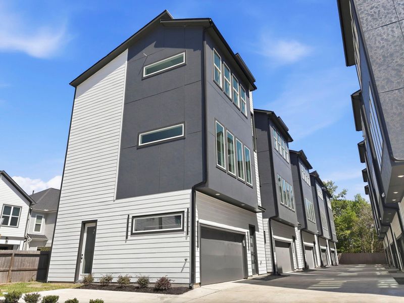 Front exterior of a new home in , Houston, TX, highlighting curb appeal (Image 22).
