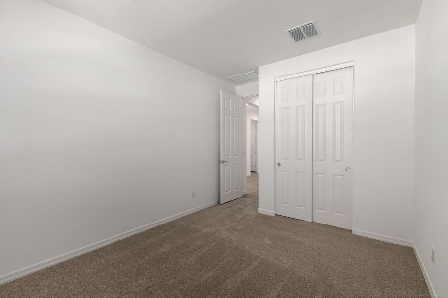 Spacious, unfurnished interior of a new home in Empire Pointe, Queen Creek (Image 11).