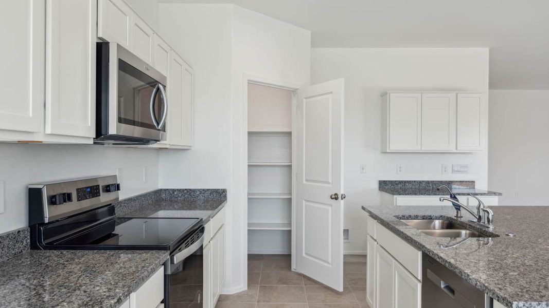 Furnished interior view inside a new home in Carlton Commons, Casa Grande (Image 9).