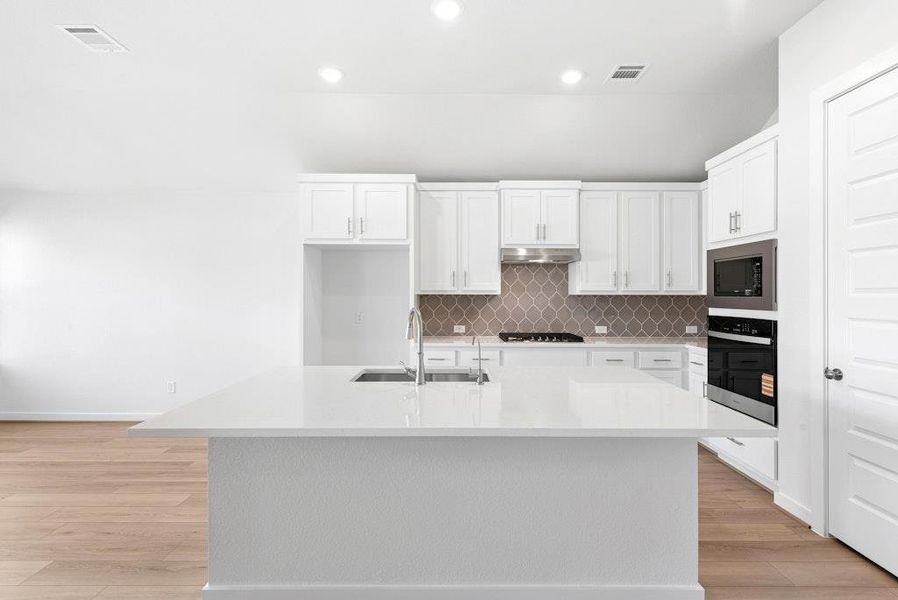 Furnished interior view inside a new home in The Colony, Bastrop (Image 8). Furnished interior view inside a new home in The Colony, Bastrop (Image 8).