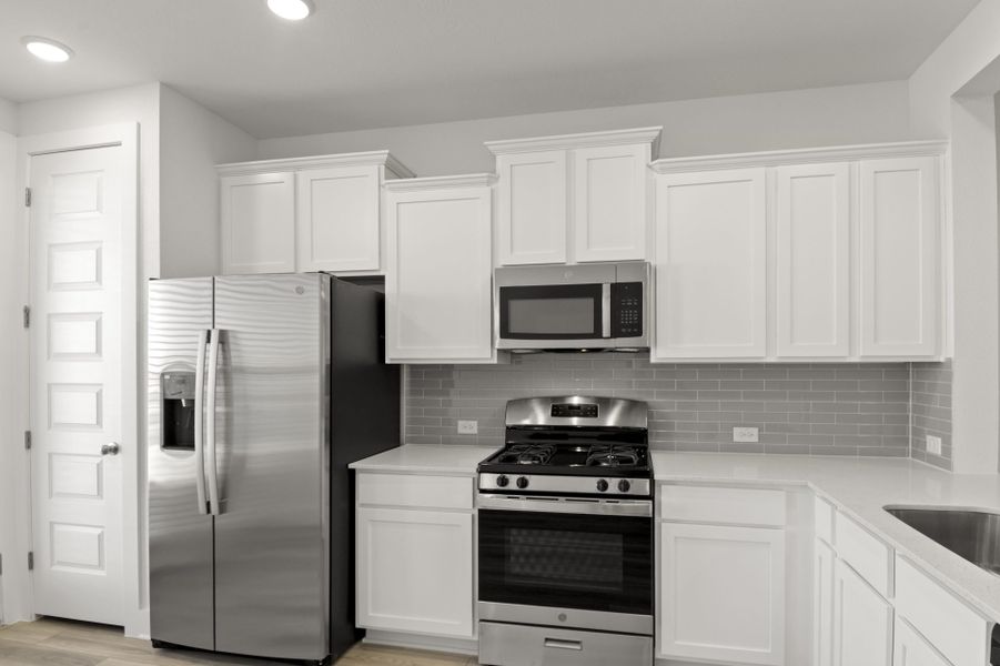 Furnished interior view inside a new home in Center 45, Round Rock (Image 11).