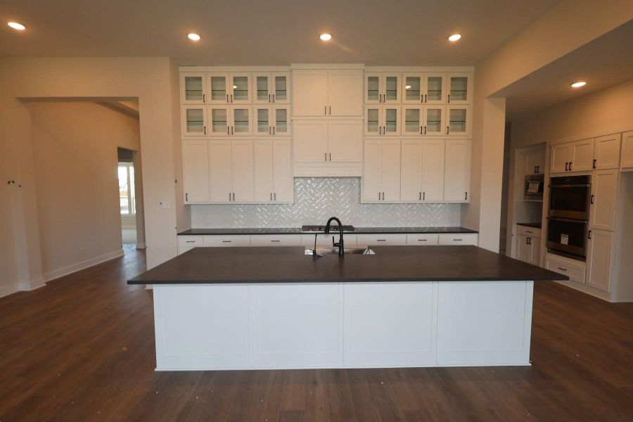 Furnished interior view inside a new home in Woodson’s Reserve, Spring (Image 9).