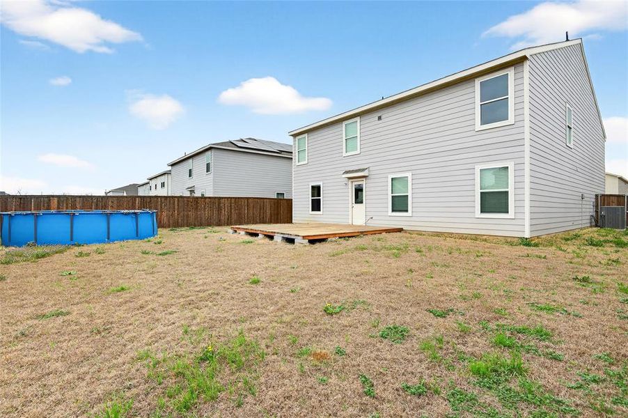 Exterior details and patio area of a home in Villages of Mayfield, Cleburne (Image 23).