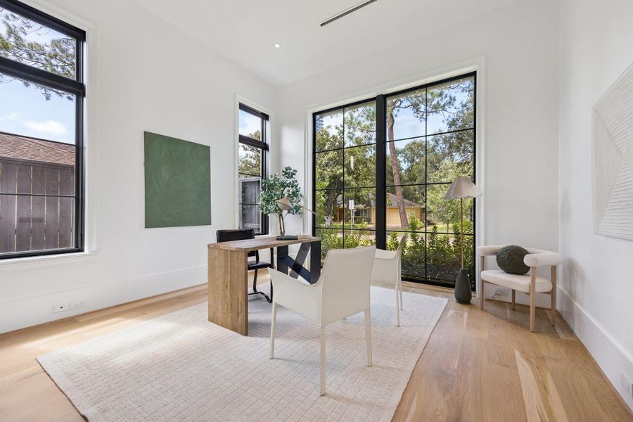 [Study / Bedroom]Located next to the foyer, the study includes a full bath and would serve as a bedroom if desired.