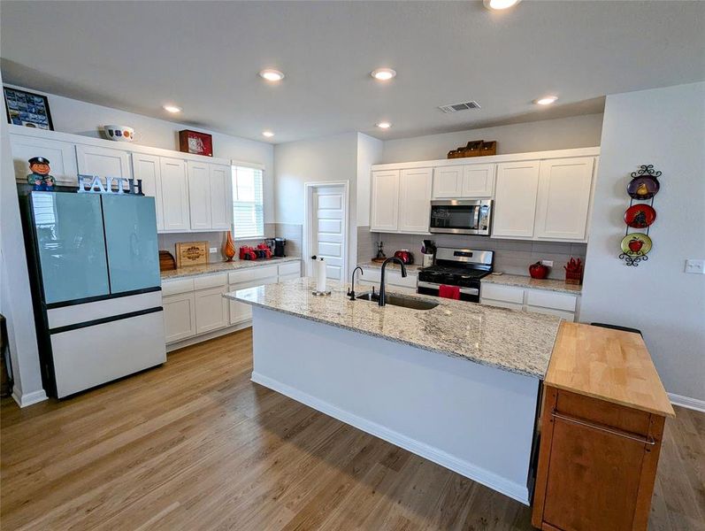 Take a look at that window in the Kitchen for natural light!