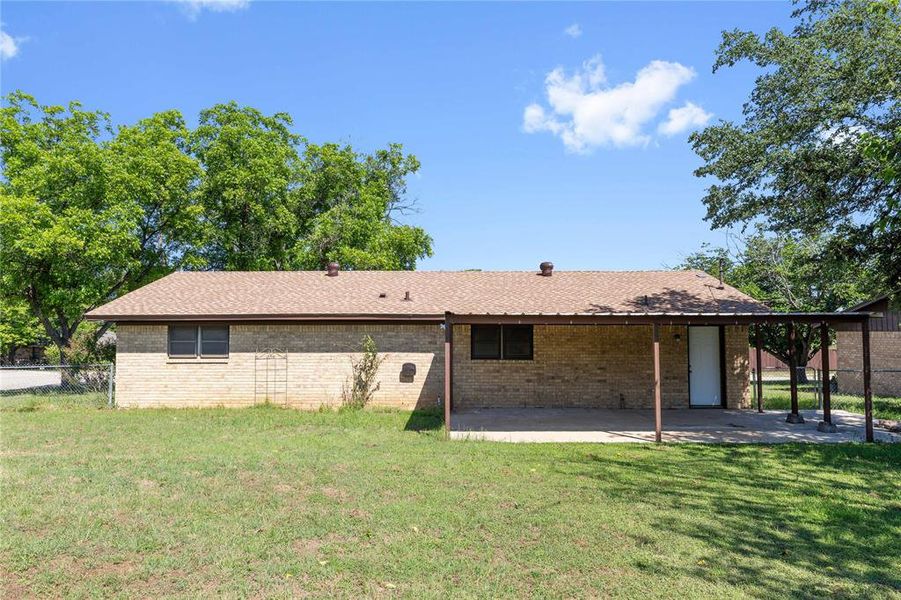 Exterior details and patio area of a home in , Brownwood (Image 4).