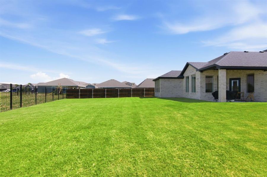 Exterior details and patio area of a home in , Burleson (Image 21).