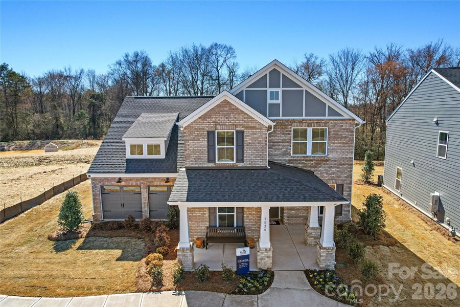 Front exterior of a new home in Riverstone, Monroe, NC, highlighting curb appeal (Image 2). Front exterior of a new home in Riverstone, Monroe, NC, highlighting curb appeal (Image 2).