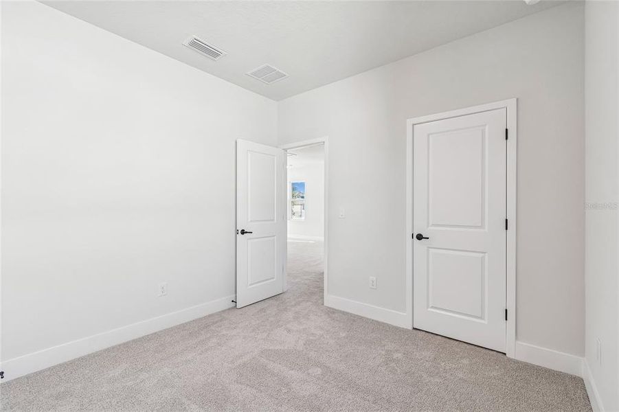 Spacious, unfurnished interior of a new home in Chapel Crossings - Garden Series, Wesley Chapel (Image 32). Spacious, unfurnished interior of a new home in Chapel Crossings - Garden Series, Wesley Chapel (Image 32).