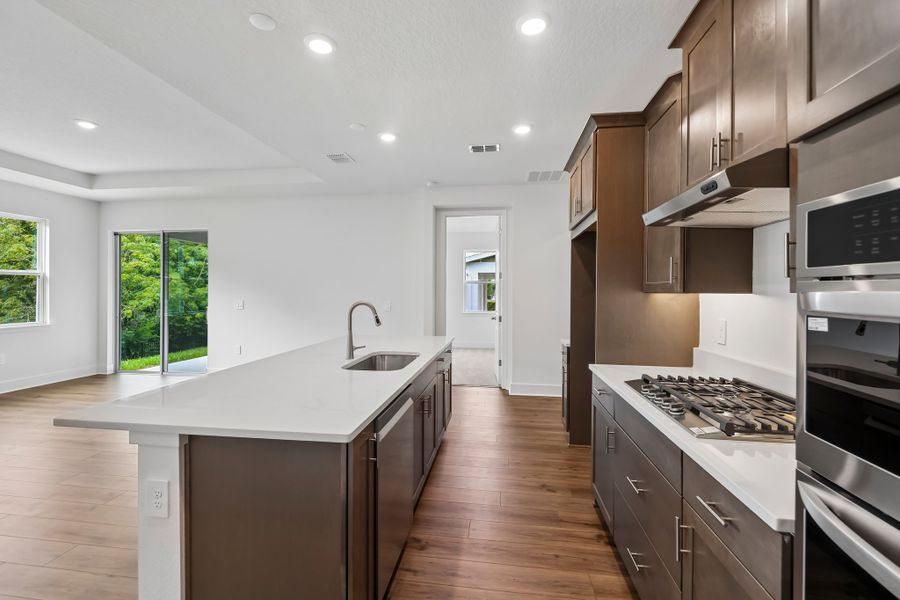 Representative furnished interior of a home built from the Lark by Hartizen Homes in Eden Crest, Apopka (Image 15).