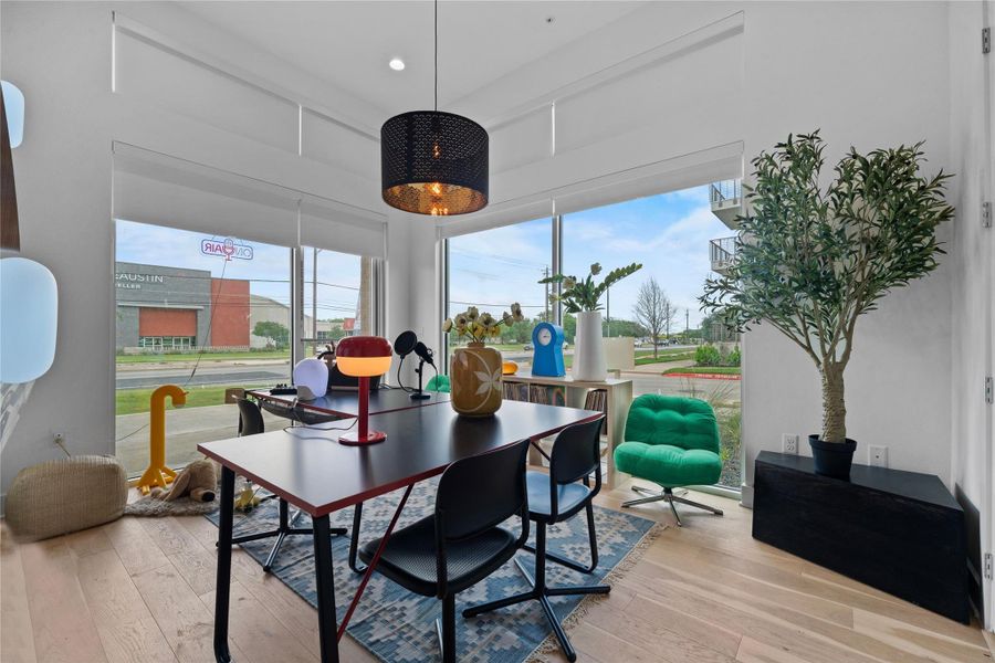 Expansive window frontage with roller shades