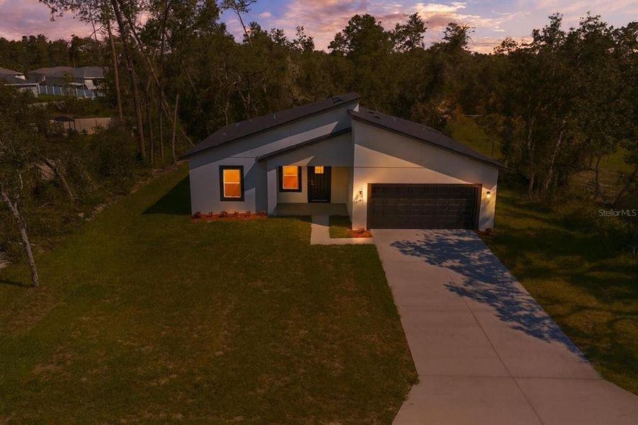 Front exterior of a new home in , Ocala, FL, highlighting curb appeal (Image 23).