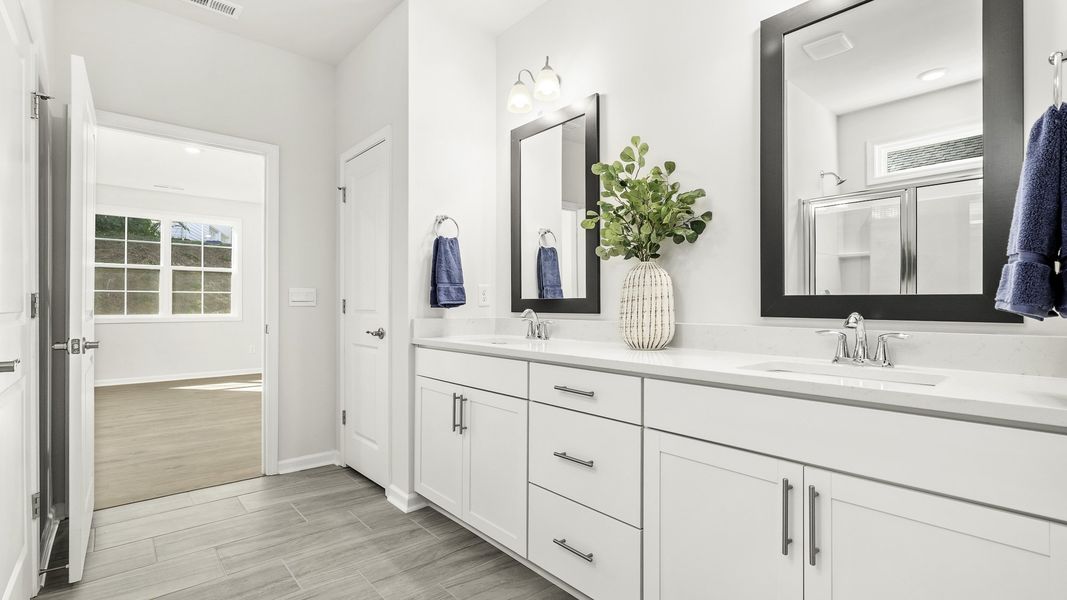 Furnished interior view inside a new home in The Villas at Kinsley, Jamestown (Image 12).