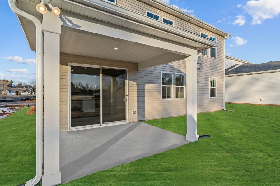 Exterior details and patio area of a home in Fox Hollow, Spartanburg (Image 23).
