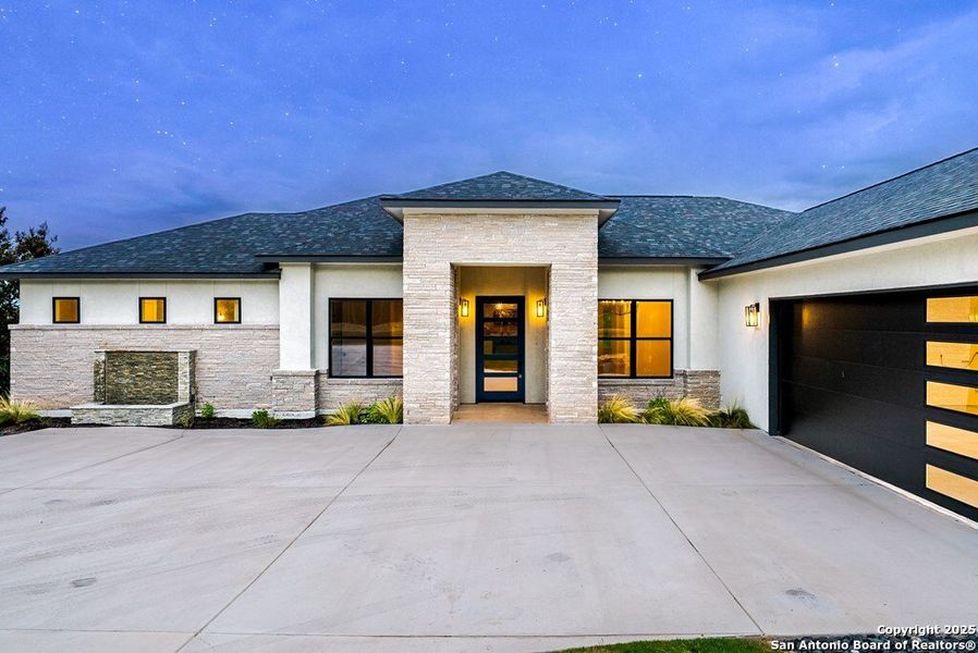 Front exterior of a new home in , Kerrville, TX, highlighting curb appeal (Image 26). Front exterior of a new home in , Kerrville, TX, highlighting curb appeal (Image 26).