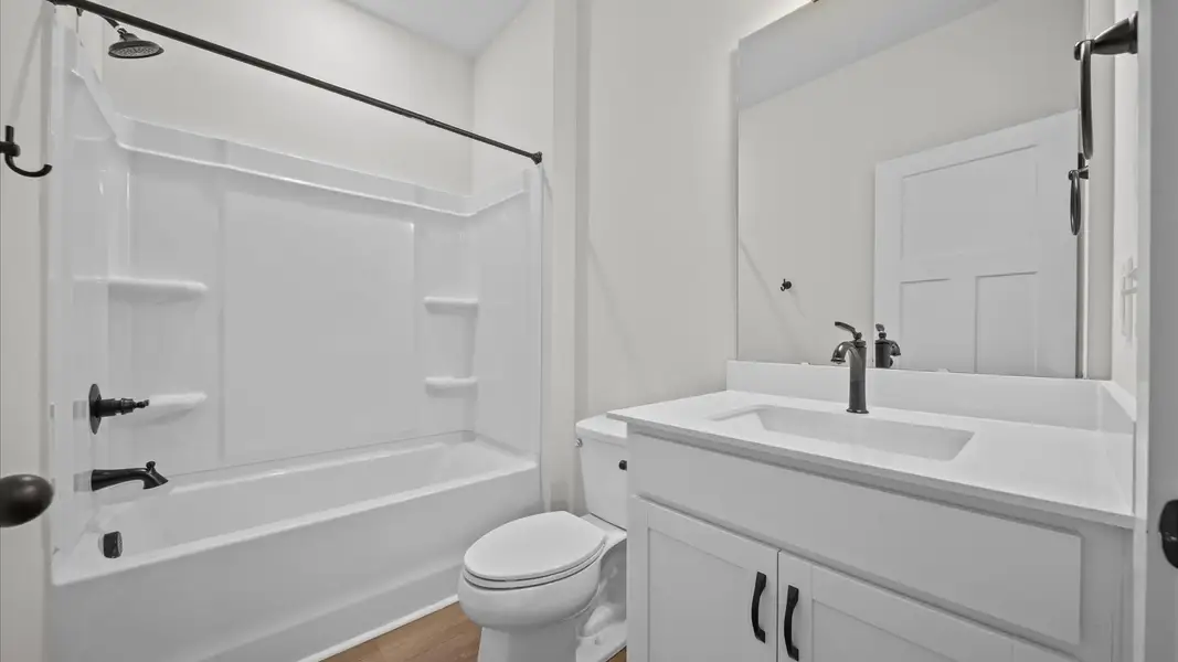 Notable full bathroom offering tasteful details and a bright, functional space